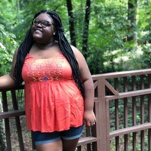 Orange sleeveless top